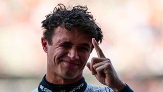 Lando Norris celebrates taking pole position for the 2025 Mexican Grand Prix at Autodromo Hermanos Rodriguez
