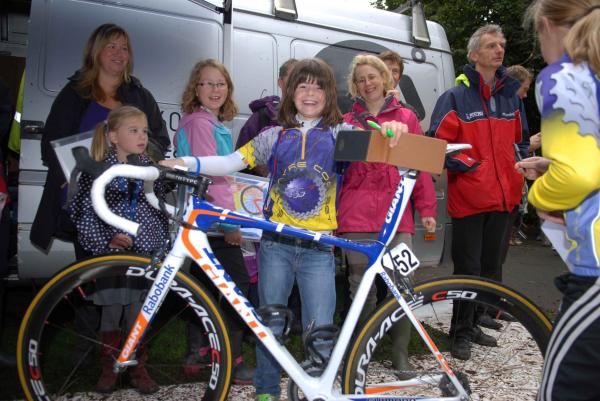 A young fan looks after the Team Rabobank bike of Theo Bos