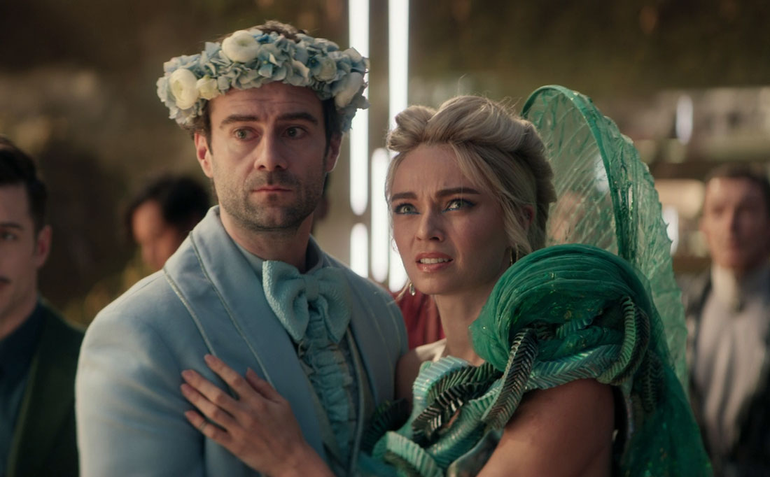 A man and woman dressed for a sci-fi wedding