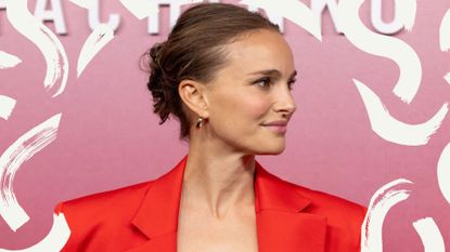 natalie portman wearing one of the best hair up styles, a messy chignon on the red carpet 