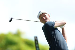 Adrian Meronk hits driver at LIV Golf Singapore 2024