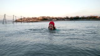 Rosee Woodland swimming at Clevedon Marine lake in winter