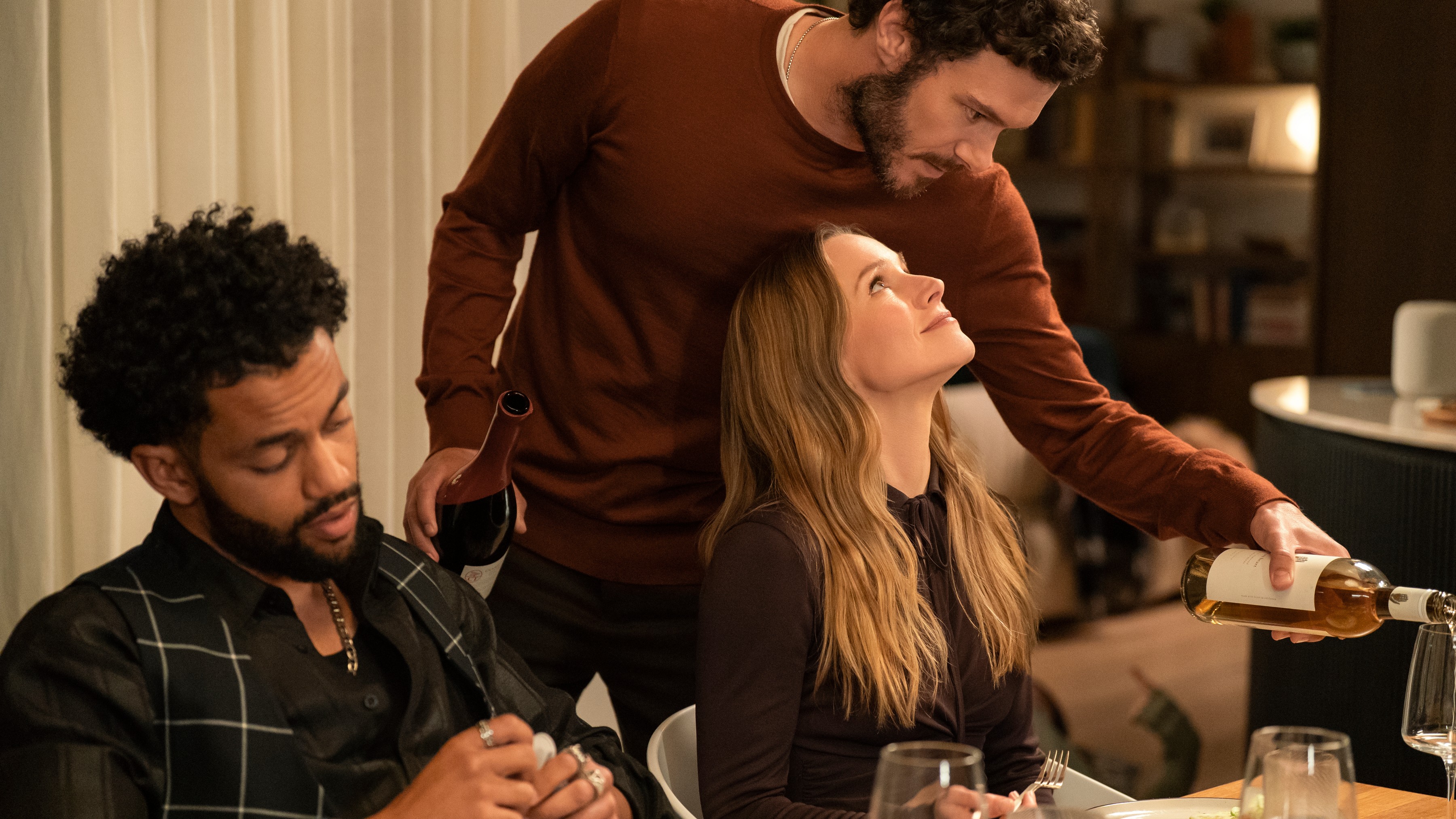 L-r: Lenny (Miles Fowler), Noah (Adam Brody) and Joanne (Kristen Bell) in a scene from "Nobody Wants This" season 2