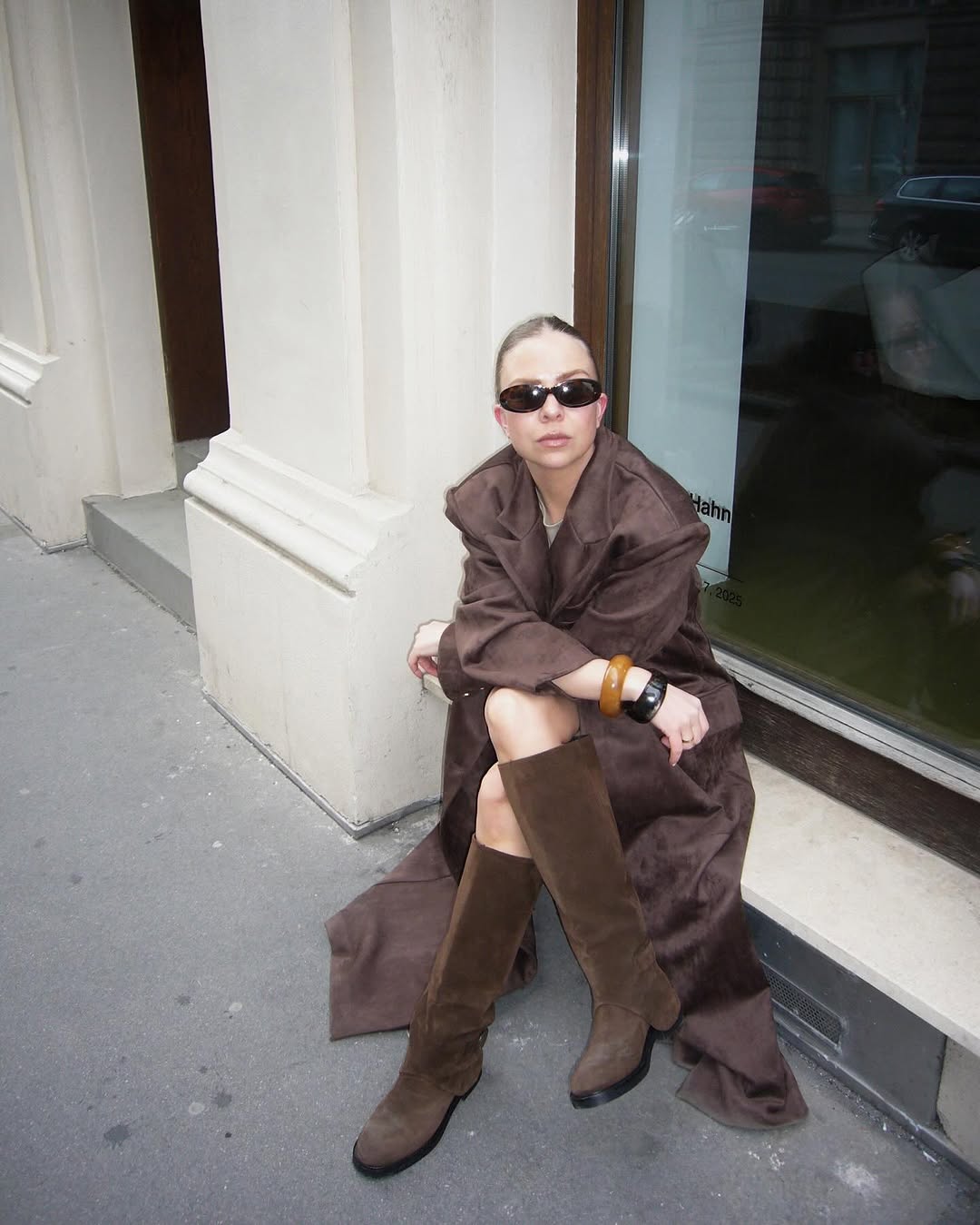 woman wearing knee high brown suede boot trend