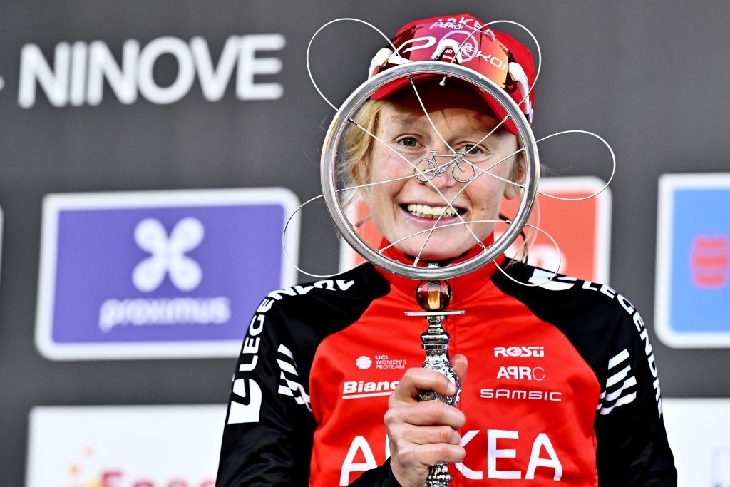 Belgian Lotte Claes of Arkea - B&amp;amp;B Hotels Women celebrates on the podium after winning the women's one-day cycling race Omloop Het Nieuwsblad (UCI World Tour), 137,9km from Gent to Ninove, Saturday 01 March 2025. BELGA PHOTO DIRK WAEM (Photo by DIRK WAEM / BELGA MAG / Belga via AFP) (Photo by DIRK WAEM/BELGA MAG/AFP via Getty Images)