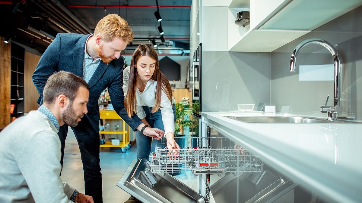 couple choosing kitchen appliances