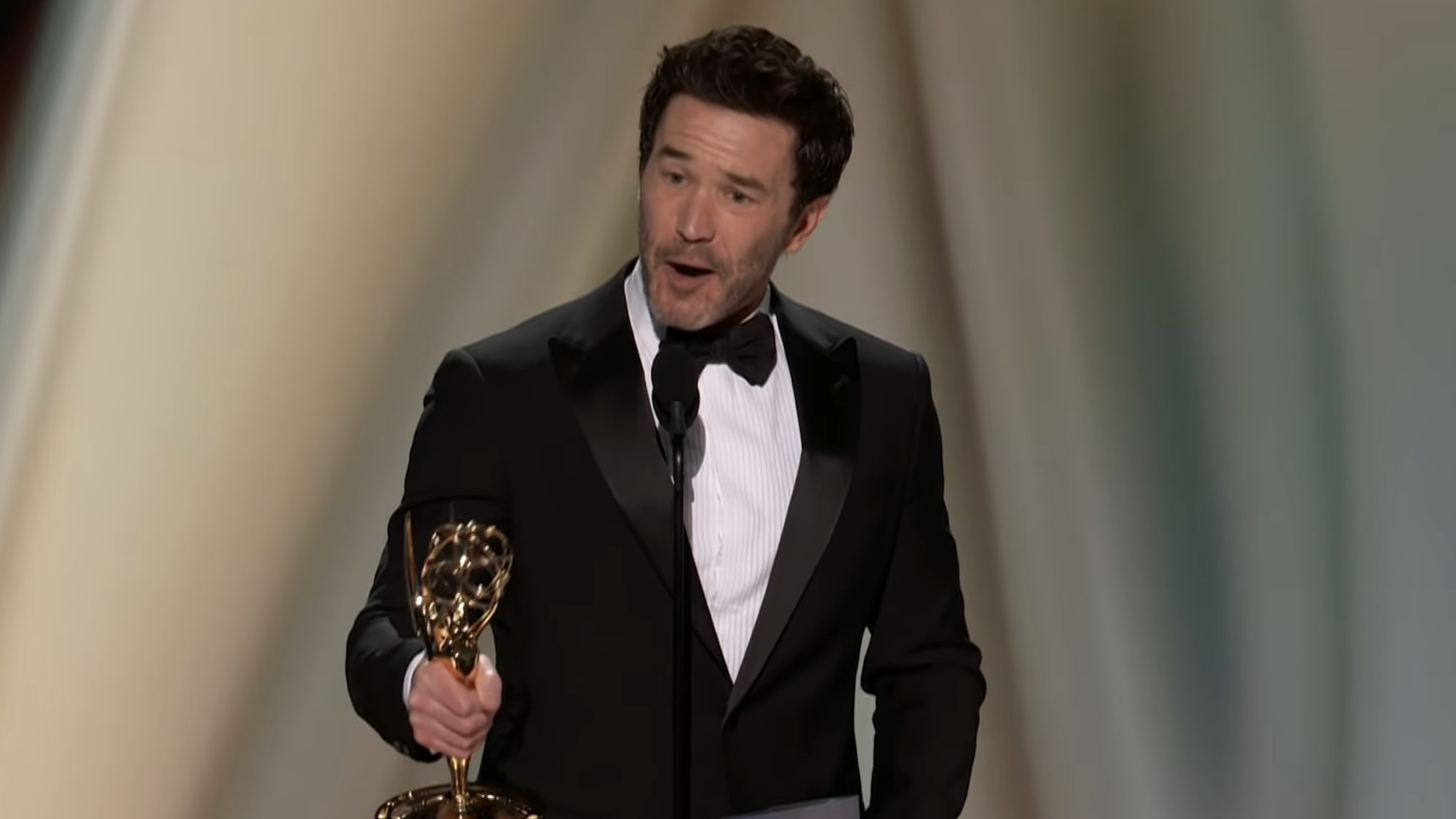 Tom Pelphrey accepting award for Task at 2026 Emmys