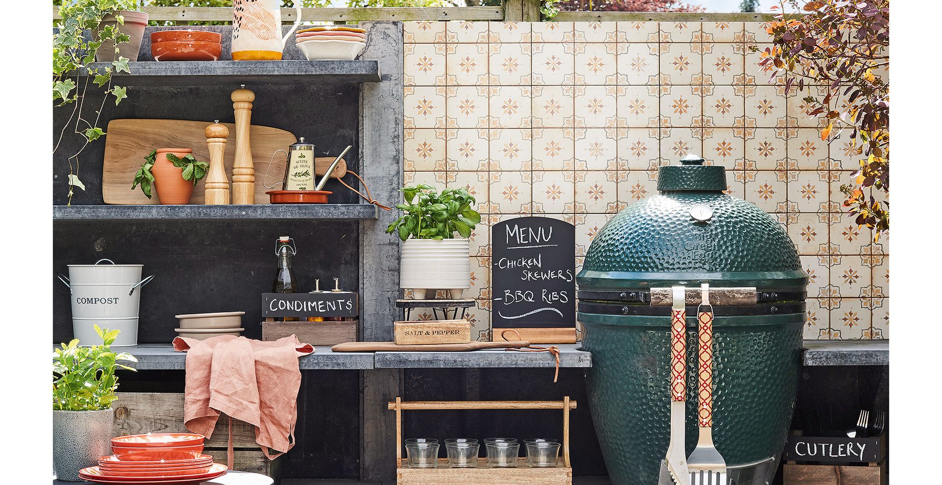 outdoor kitchen area with a tiled splashback
