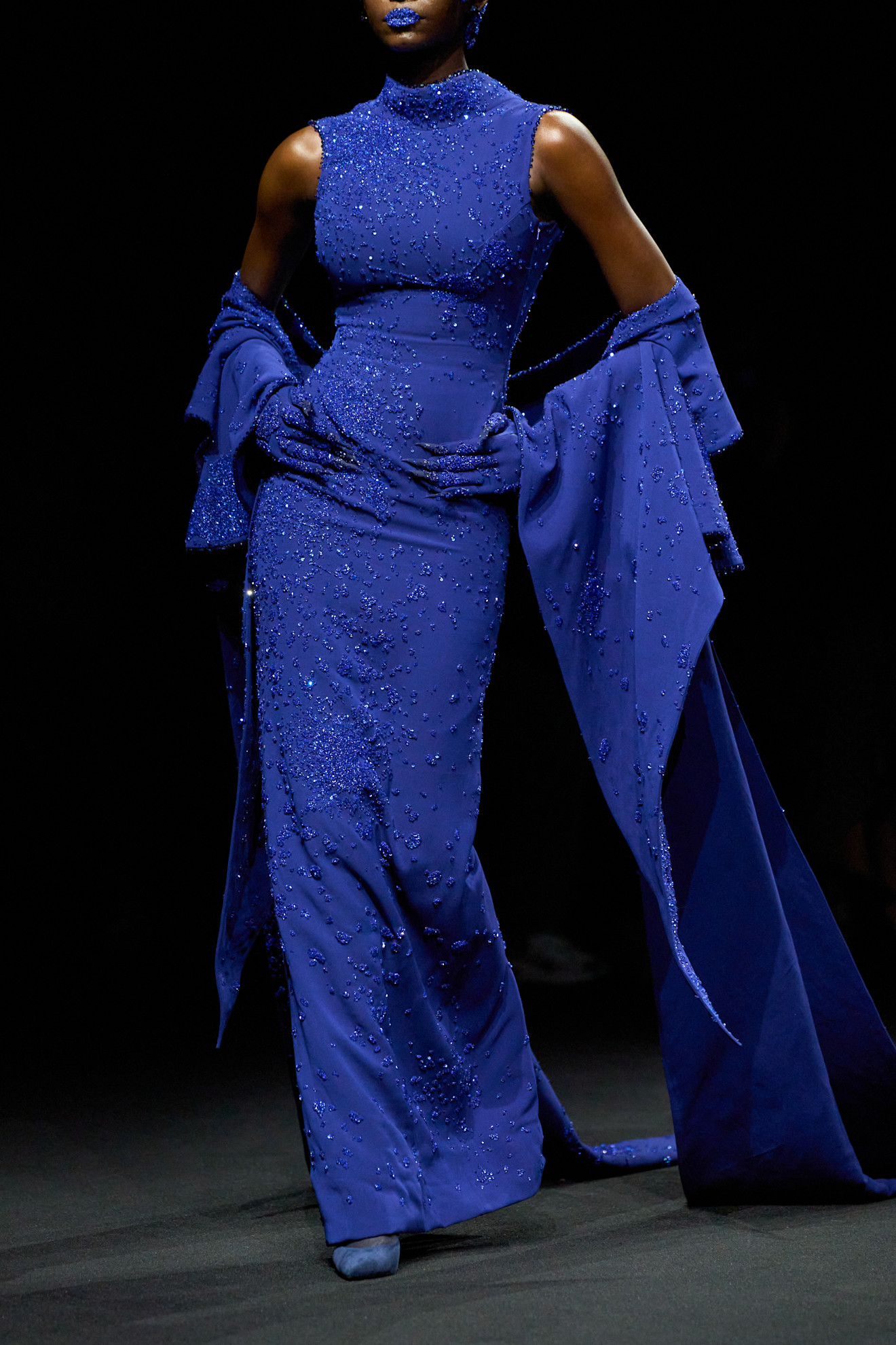 a Robert Wun model wearing cobalt blue