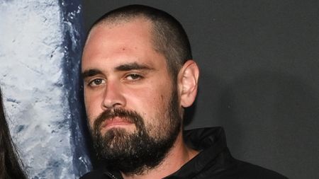 Nick Reiner posing a the Spinal Tap II premiere. 