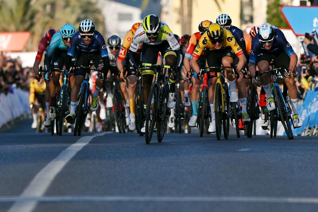 ALTEA SPAIN FEBRUARY 01 A general view of Biniam Girmay of Eritrea and Team Intermarche Circus Wanty Ivn Garca Cortina of Spain and Movistar Team Olav Kooij of The Netherlands and Team Jumbo Visma Jos Joaqun Rojas of Spain Alex Aranburu of Spain and Movistar Team Antonio Jess Soto of Spain and Team Euskaltel Euskadi and Samuele Battistella of Italy and Astana Qazaqstan Team and the peloton sprint to win during the 74th Volta a la Comunitat Valenciana 2023 Stage 1 a 1894km stage from Orihuela to Altea VCV2023 VoltaValenciana on February 01 2023 in Altea Spain Photo by Dario BelingheriGetty Images