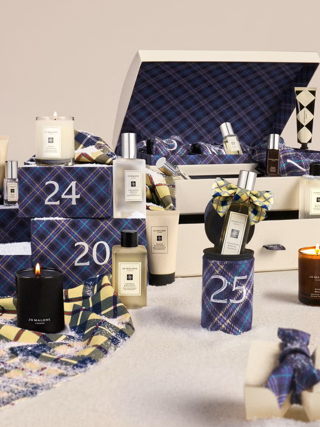 An advent calendar from Jo Malone London, including scented candles, colognes, body care, and more