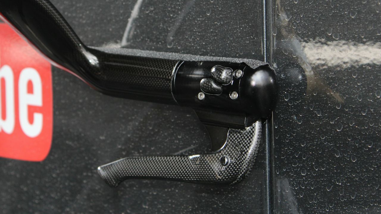 The custom bars include Di2 shift buttons on the cowhorns.