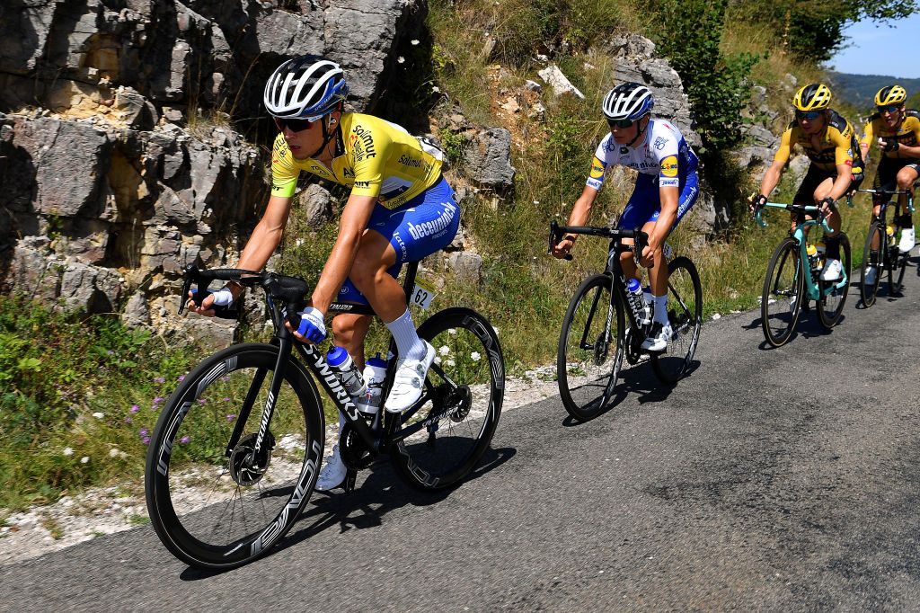 SAINTVULBAS FRANCE AUGUST 08 Andrea Bagioli of Italy and Team Deceuninck QuickStep Yellow Leader Jersey Mauri Vansevenant of Belgium and Team Deceuninck QuickStep Tony Martin of Germany and Team Jumbo Visma during the 32nd Tour de LAin 2020 Stage 2 a 141km stage from Lagnieu to Llex MontsJura 896m tourdelain TOURDELAIN TDA on August 08 2020 in SaintVulbas France Photo by Justin SetterfieldGetty Images