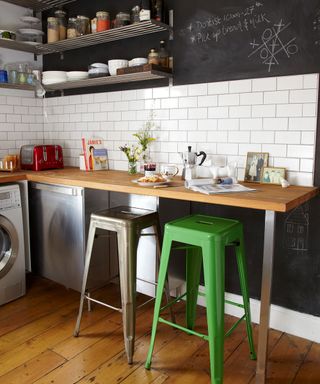 kitchen with wooden flooring and white walls