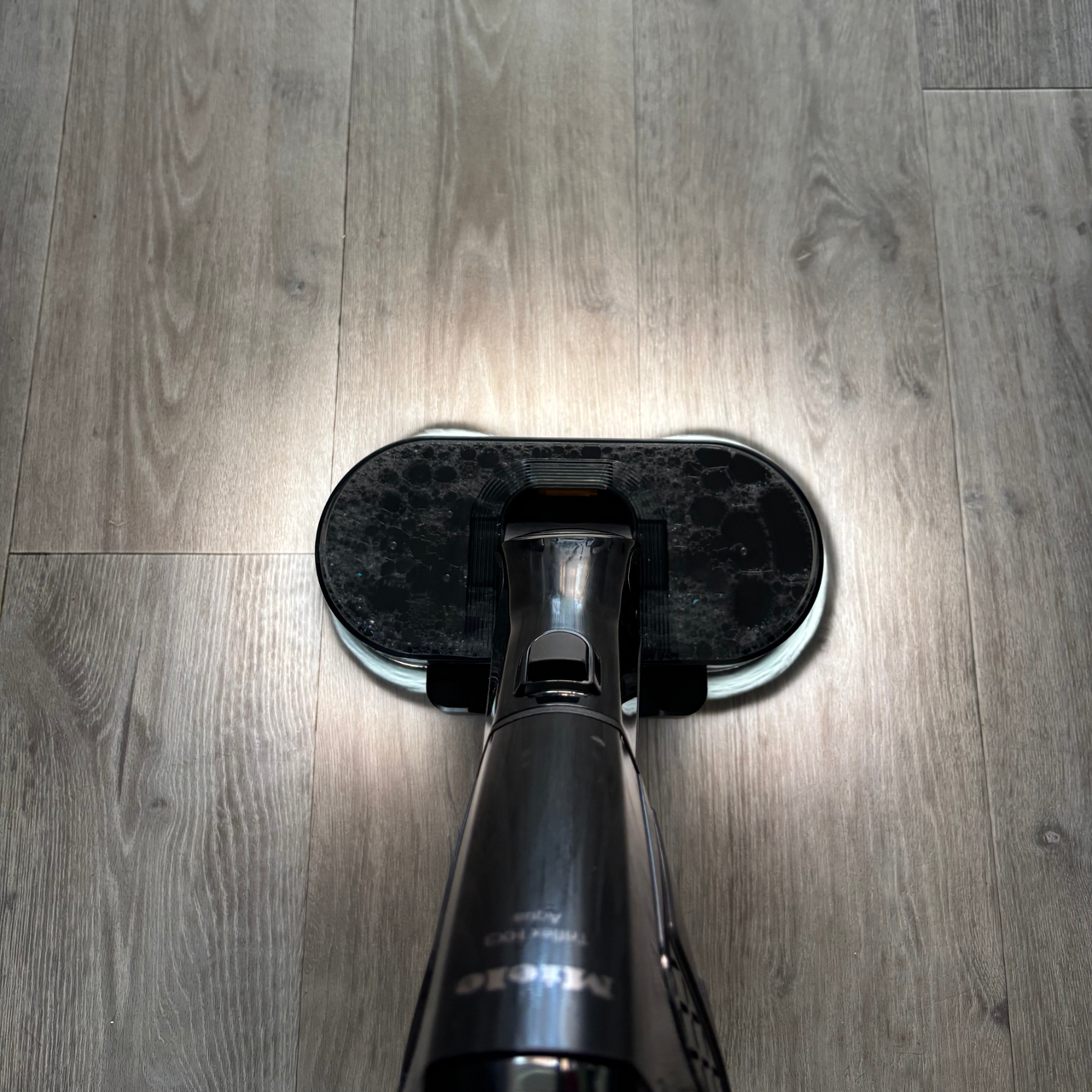 Miele Triflex HX3 Aqua mop illuminating hard floor