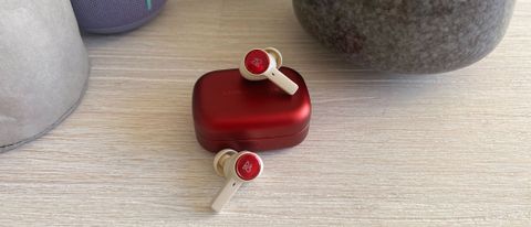 Bang & Olufsen Beoplay EX earbuds in red with charging case