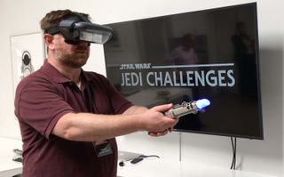 With an AR headset from Lenovo and a lightsaber controller, you can take on Kylo Ren in Star Wars Jedi Challenges. (Credit: Tom's Guide)