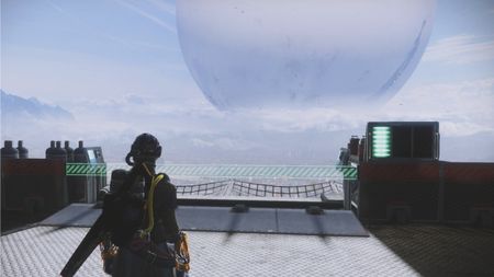 Destiny 2 hidden net: A Warlock standing next to the Tower Hangar goals overlooking the Traveler.
