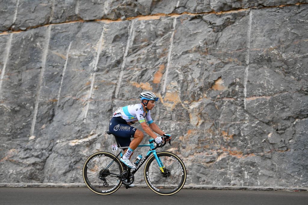 Alexey Lutsenko (Astana) made a late solo effort