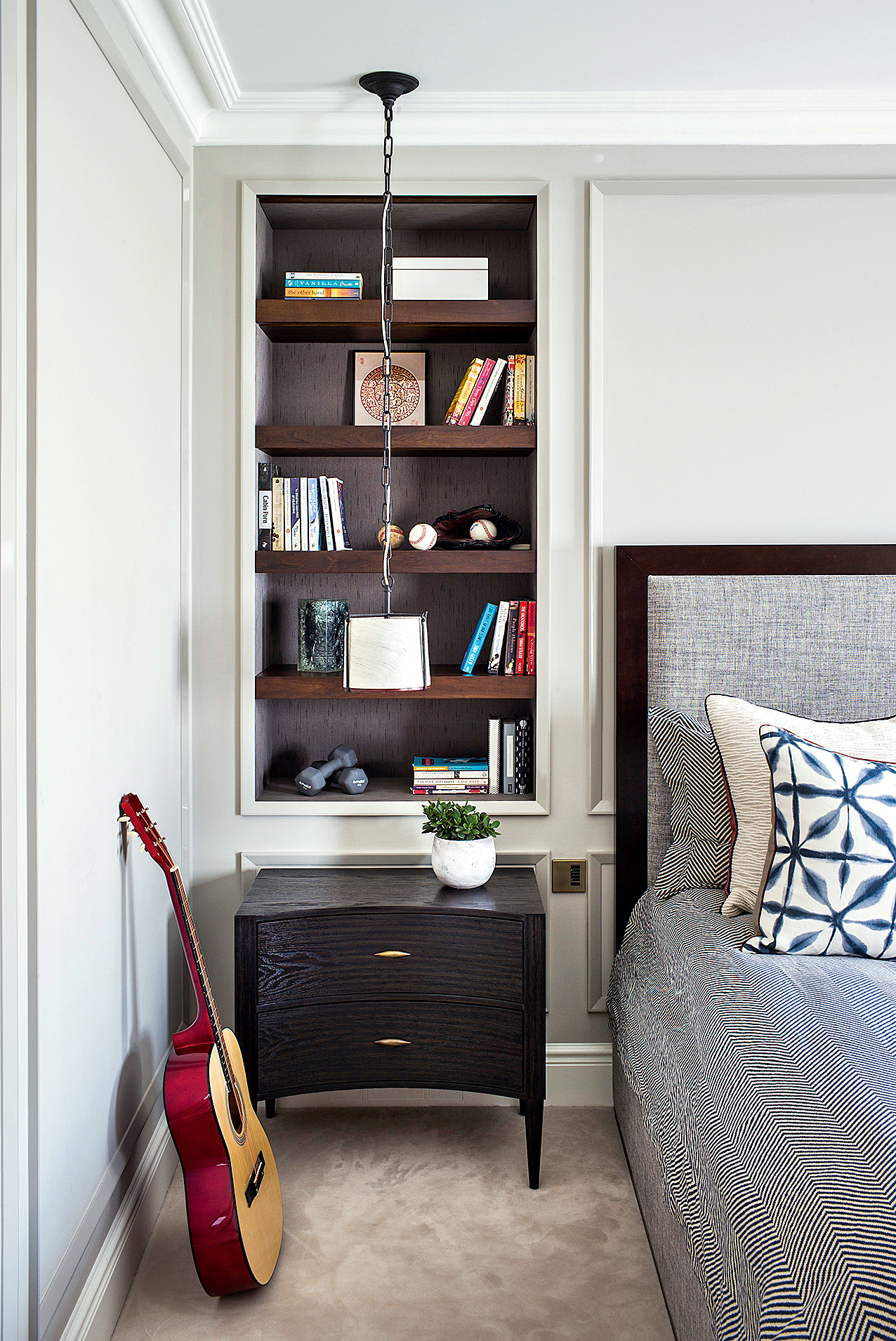 Bedroom with built in shelves