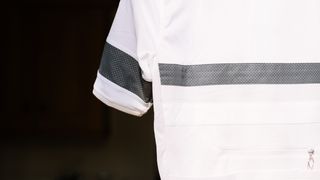 A close up of a white cycling jersey