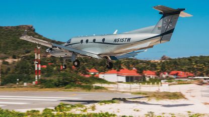 Plane landing at St Barth's airport © Hugh Mitton / Alamy Stock Photo