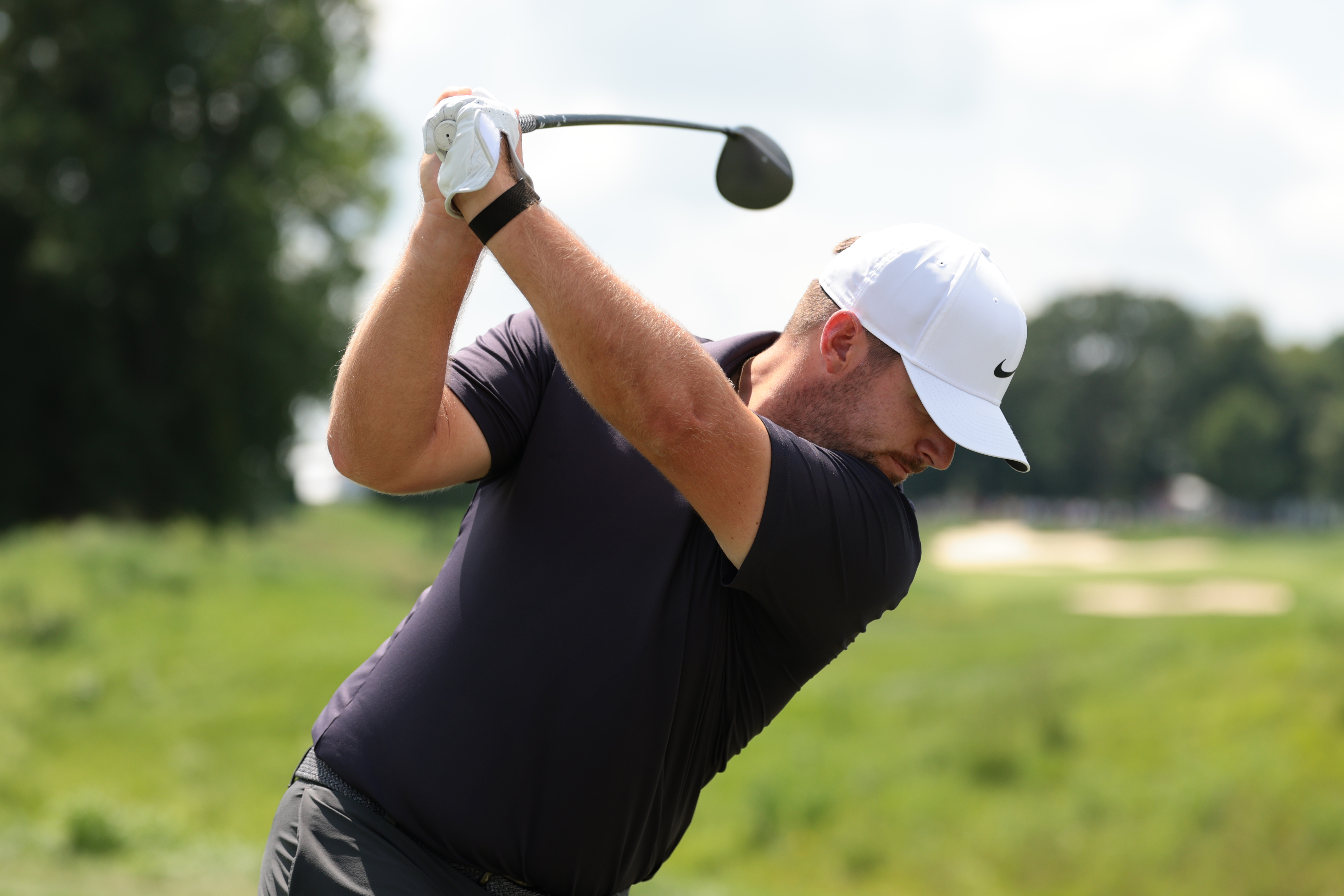 Chris Gotterup at the top of his backswing