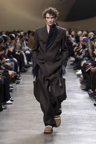 Sacai A/W 2025 menswear collection runway show