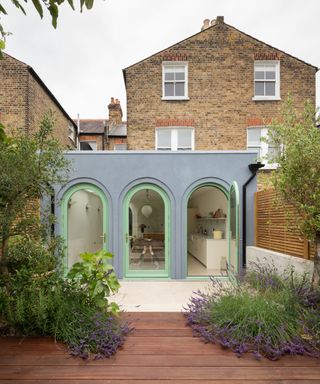 Blue and green arches on a London terrace house extension