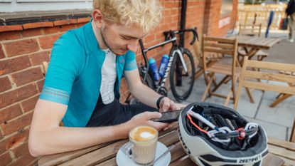 Image shows a rider using a cycling app.