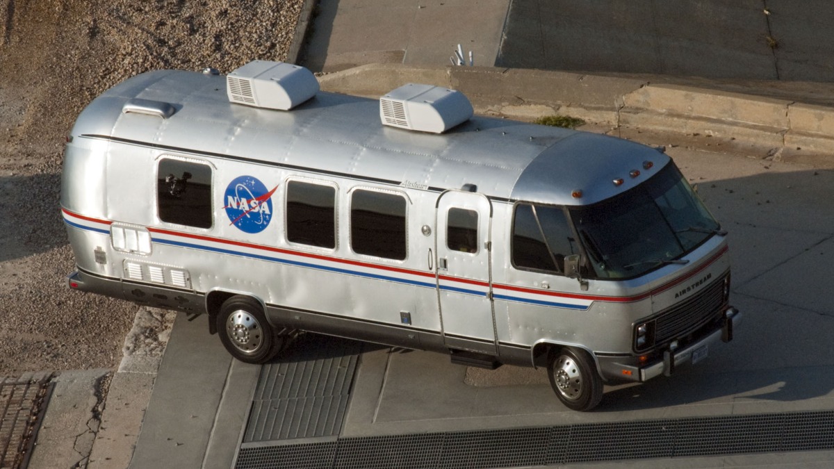 The modified Airstream version of Astrovan for the space shuttle program transports the STS-135 astronauts to the pad at NASA's Kennedy Space Center in Florida, to participate in a launch countdown simulation exercise in 2011.