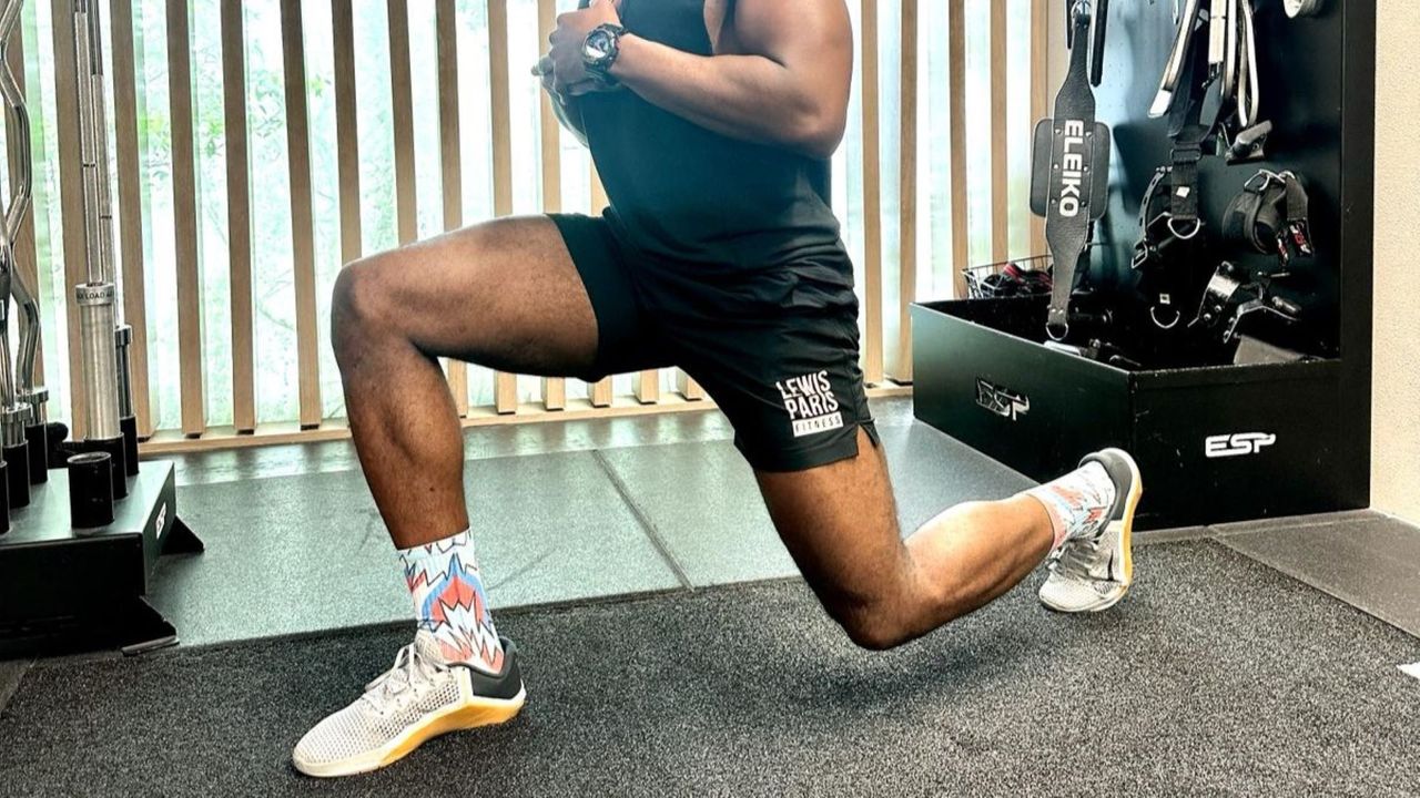 Personal trainer Lewis Paris performs a lunge