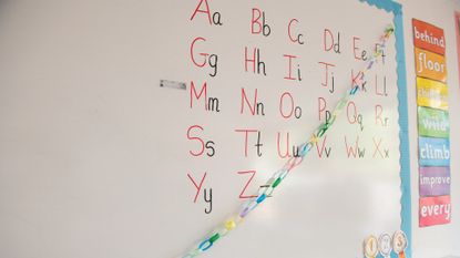 Primary school classroom with phonics on white board