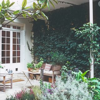 A patio with a garden furniture set