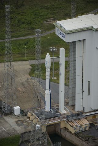 The European Space Agency's Vega VV02 rocket stands fully assembled on its launch pad, April 22, 2013. Vega VV02 is scheduled for liftoff from Europe’s Spaceport in Kourou, French Guiana, on May 4, 2013, carrying two satellites.