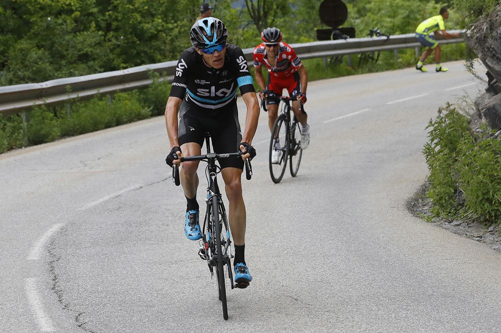 Richie Porte chases Chris Froome after the Sky rider attacked on the final climb of stage 5 at the Criterium du Dauphine
