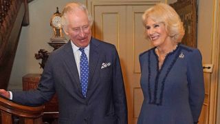 Camilla, Queen Consort, joined by King Charles III, hosts a reception at Clarence House for authors