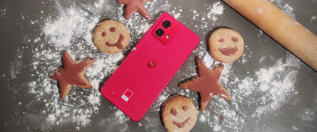 The Moto G84 looking festive amongst some baked goods