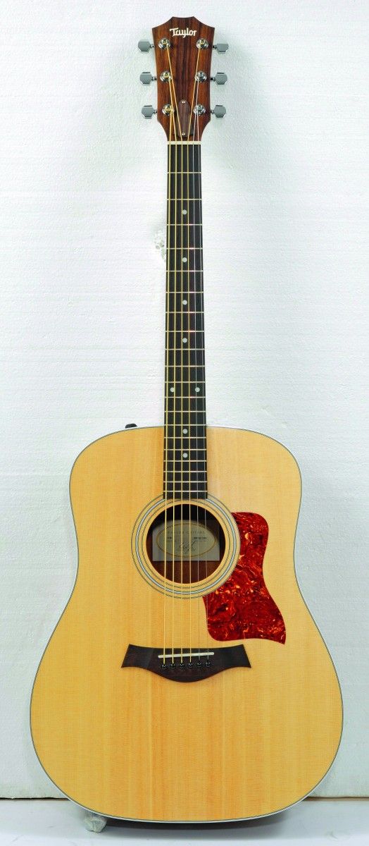 The 210 E's neck has a finger-jointed headstock