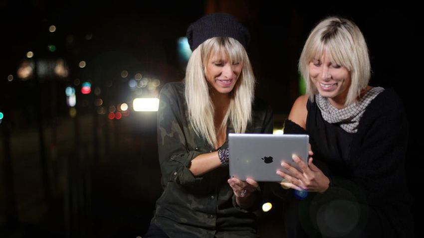 BLOND:ISH "get in touch with the groove" on their iPad.