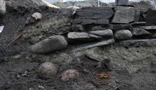 Archaeologists uncovered the foundations of a wooden church where the body of the Viking king Olaf Haraldsson may have been enshrined after he was declared a saint.
