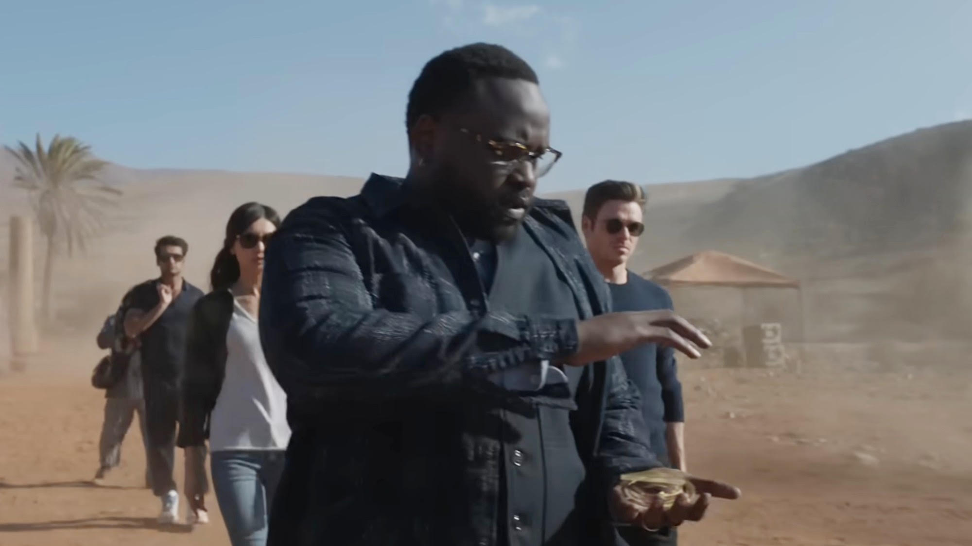Brian Tyree Henry holding power in his hands in Eternals