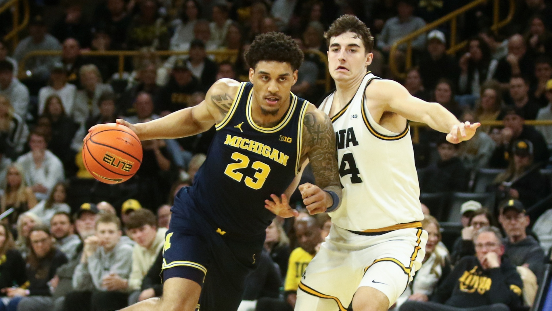Yaxel Lendeborg of the Michigan Wolverines dribbling the ball in a Big Ten basketball clash