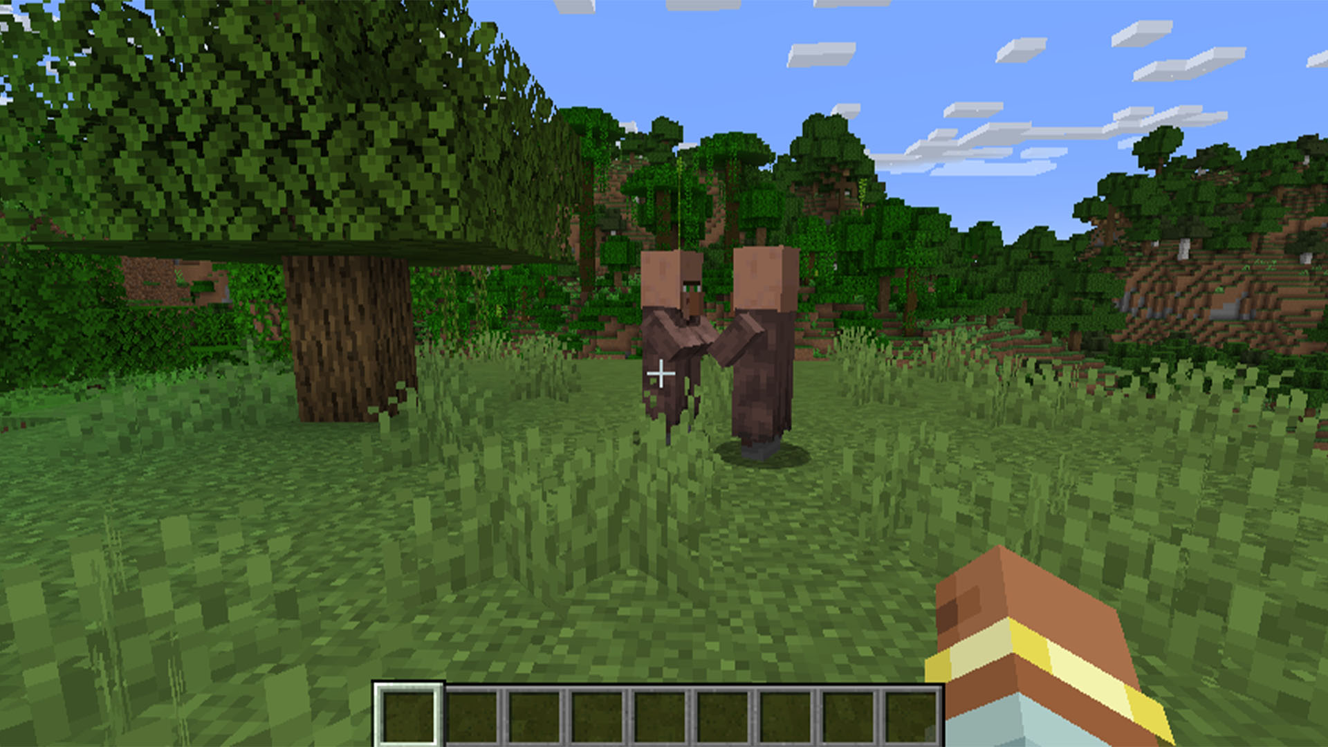 Two villagers standing around in Minecraft