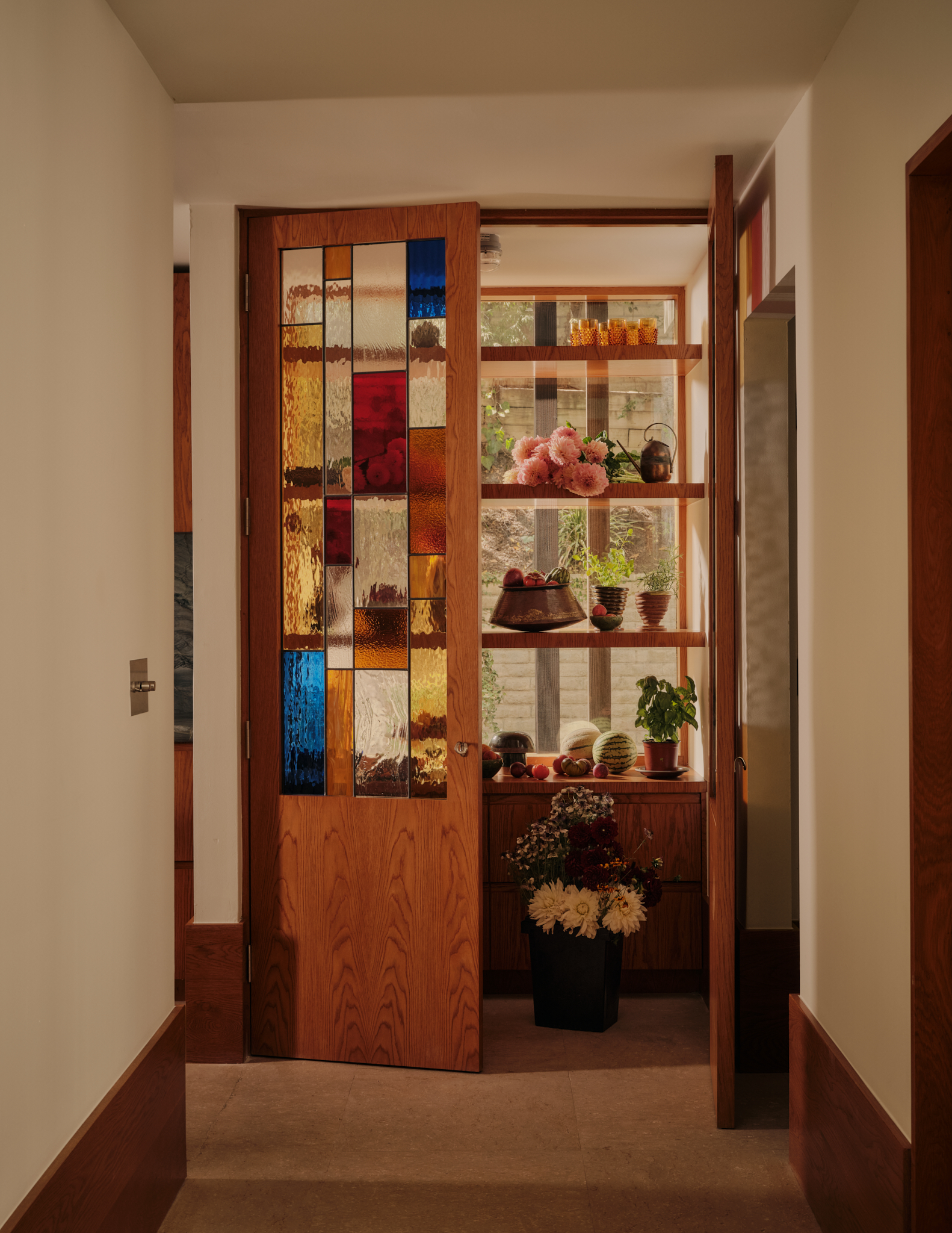 stained glass doors behind pantry