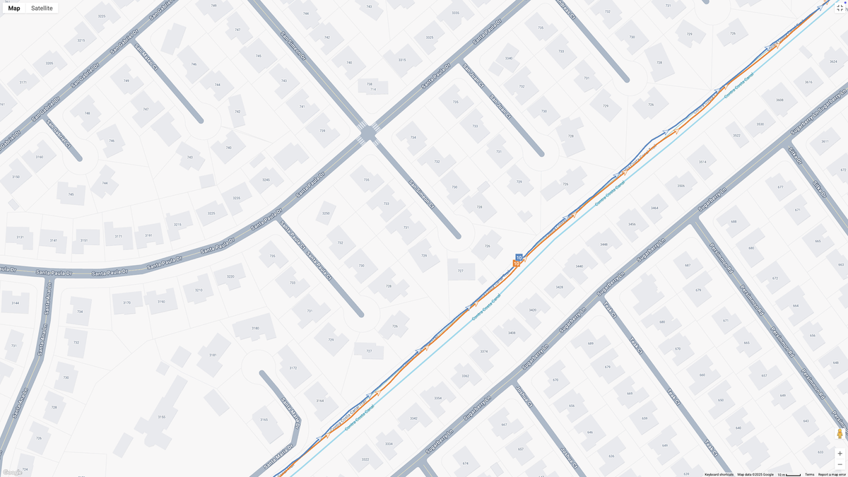 A Google Maps map view showing GPS location data for a workout, with the COROS APEX 4 (orange line) and Garmin Forerunner 970 (blue line) showing how their dual-band GPS tracking compares.