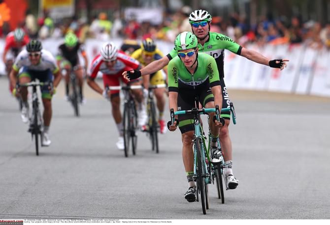 Graeme Brown celebrates as teammate Theo Bos wins stage 2 of Tour de Langkawi