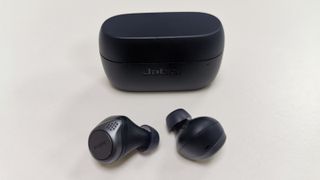 Jabra Elite Active 75t earphones review: earbuds pictured next to the charging case