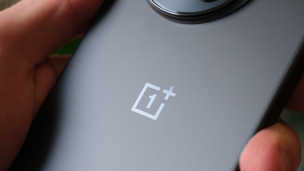 Close up of the OnePlus logo on a OnePlus 13R phone